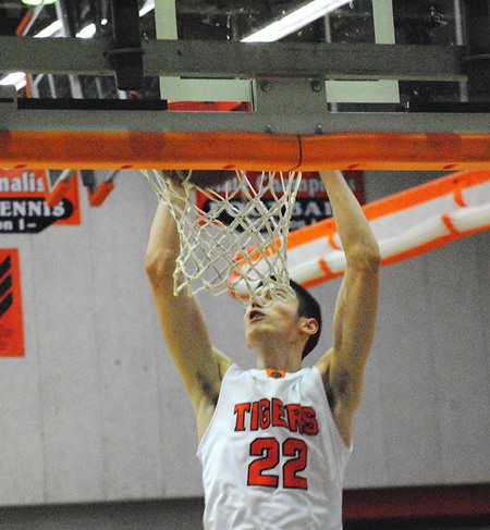 Marshfield's Adam Fravert throws down a dunk during the Tigers' 71-61 win over D.C. Everest on Friday night at Marshfield High School. (Photo by Paul Lecker/MarshfieldAreaSports.com)