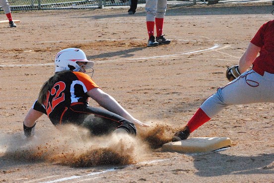 Marshfield's Megan Donahue slides safely into third base during the first inning of the Tigers' 8-5 win over Wisconsin Rapids at the Marshfield Fairgrounds on Thursday. (Photo by Paul Lecker/MarshfieldAreaSports.com)