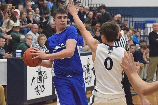 Hot-shooting Newman Catholic takes down Auburndale boys basketball